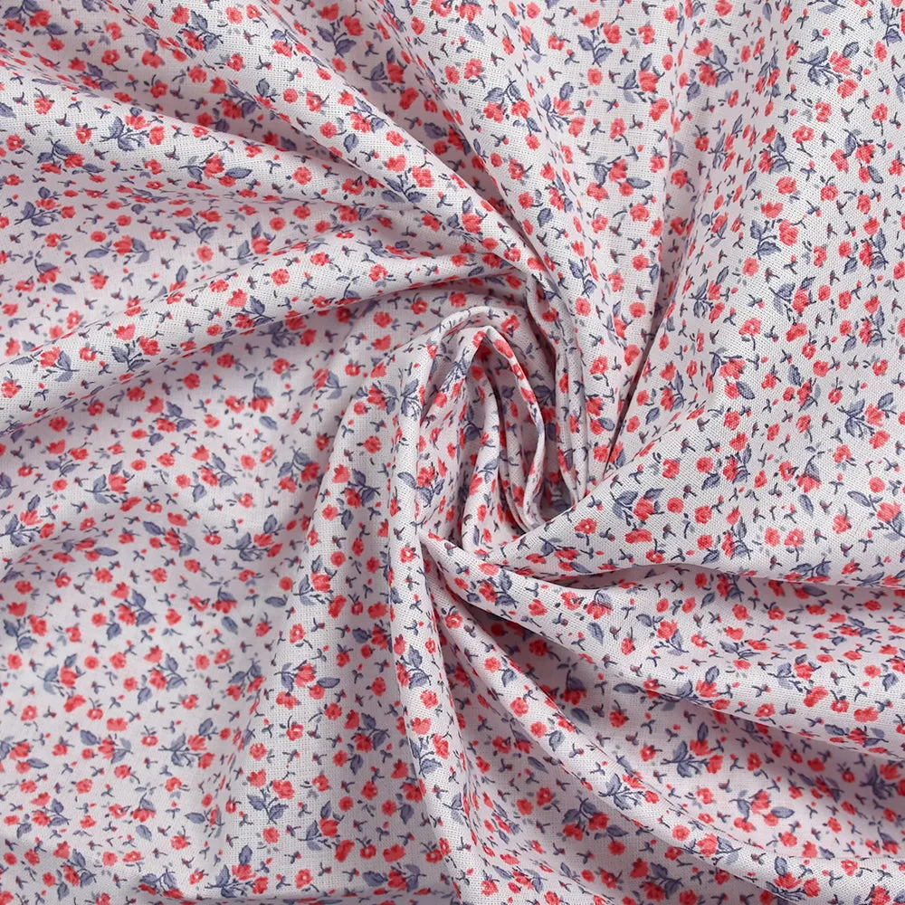 Coton imprimé fin mini fleurs rouge fond blanc